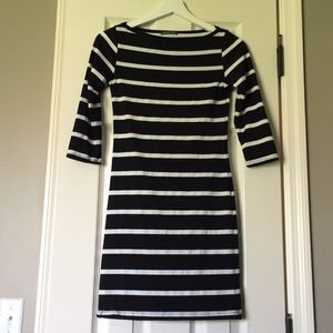 Fitted black and white striped dress